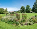 Flower bed with echinacea and asters at spa garden Schliersee Royalty Free Stock Photo