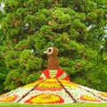 A flower bed in the form of a peacock in a park on the island of Mainau, Germany Royalty Free Stock Photo