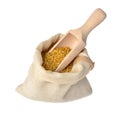 Flower bee pollen in a bag of natural cloth and a wooden slove is isolated on a white background.Natural remedy for