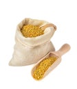 Flower bee pollen in a bag of natural cloth and a wooden slove is isolated on a white background.Natural remedy for