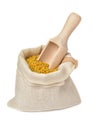 Flower bee pollen in a bag of natural cloth and a wooden slove is isolated on a white background.Natural remedy for