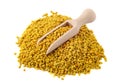 Flower bee pollen and a wooden slove is isolated on a white background. Natural remedy for immunity enhancement