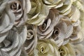 Flower blossoms folded from book pages