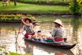 Flower boat and boat with man in Suan Luang Rama IX Flowers Festival