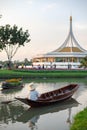 Flower boat and boat with man in Suan Luang Rama IX Flowers Festival