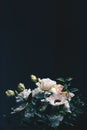 Flower bouquet on black background, beautiful floral arrangement, creative flowers and floristic design idea