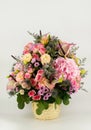 Flower bouquet, colorful flowers on basket Royalty Free Stock Photo