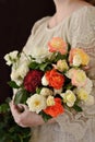 Flower bouquet composition in an woman`s hands. Royalty Free Stock Photo