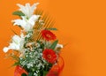 Flower bouquet over orange Royalty Free Stock Photo