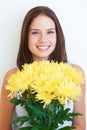 Flower bouquet, studio face portrait and happy woman with floral product, sustainable gift or yellow present. Nature Royalty Free Stock Photo