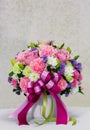 Flower bouquet in white ceramic pot