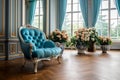 Flower bouquets in large luxury interior home with turquoise chair Royalty Free Stock Photo