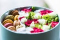 Flower box with flowers and macarons composition closeup Royalty Free Stock Photo