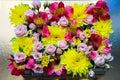 Flower box made of Yellow Chrysanthemums, Pink rose roses and Vivid Pink Alstroemerias Royalty Free Stock Photo