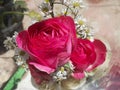 Flower bucket of pink rose, aster flower and white rose.