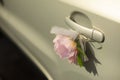 Flower bud on a car door. Wedding decoration on the car door handle Royalty Free Stock Photo
