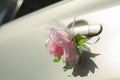 Flower bud on a car door. Wedding decoration on the car door handle Royalty Free Stock Photo