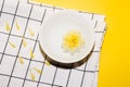 Flower in a ceramic bowl with water. Relaxation body care Royalty Free Stock Photo