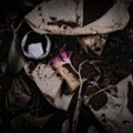 A Flower and Coffee Filters on a Compost Heap