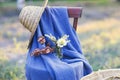 Flower composition on the chair decorated with texstile Royalty Free Stock Photo