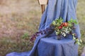 Flower composition on the chair decorated with texstile Royalty Free Stock Photo