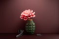 The flower in the disassembled hand grenade - anti-war concept