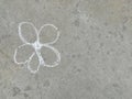 Flower is drawn with chalk on the asphalt. summer. banner place for text, children, creativity, copy space