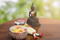 Flower float water in bowl for bath buddha statue Royalty Free Stock Photo