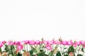 Flower frame of pink roses, branches and leaves on white background. Flat lay, Top view. Spring time background Royalty Free Stock Photo