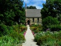 Flower Garden Pathway Leading to a Church Royalty Free Stock Photo