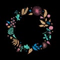 Floral wreath with green foliage and flower on black background.