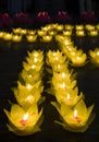 Flower garlands and colored lanterns for celebrating Buddha`s birthday in Eastern culture. They are made from cut paper and candl Royalty Free Stock Photo