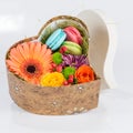 Flower gerbera and macaroon in heart shaped box Royalty Free Stock Photo