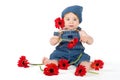 Flower Girl - baby amongst fresh gerberas Royalty Free Stock Photo