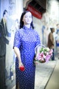 Flower girl wearing a cheongsam