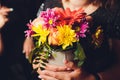 Flower girl at a wedding holding a basket of flowers. Royalty Free Stock Photo