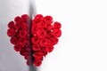 Flower heart. Symbol love and valentines day. Red roses collected in the shape of a heart. Sample greeting card. Flower Royalty Free Stock Photo