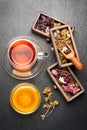 Flower herbal tea with honey and dried herbs and flowers. top view Royalty Free Stock Photo