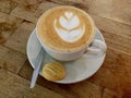 Flower Latte Art . Coffee and cookie. Royalty Free Stock Photo