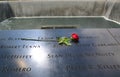 Flower left at the National 9/11 Memorial at Ground Zero in Lower Manhattan Royalty Free Stock Photo