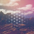 Flower of life sacred geometry illustration with intelocking circles and light dots in front of photographic background Royalty Free Stock Photo