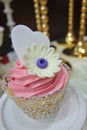 Flower and loving heart cupcake