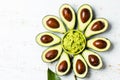 Flower made from avocado and guacamole bowl