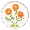 Flower made of vegetables on plate