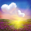 Flower meadow with heart clouds
