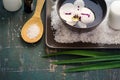 Flower orchids in bowl of water and SPA setting. Royalty Free Stock Photo