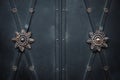 Flower ornaments on black door Royalty Free Stock Photo