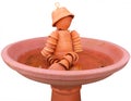 Flower pot man in a Bird Bath Royalty Free Stock Photo