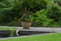 Flower Pot and Pond, Tintinhull Garden, Somerset, England, UK Royalty Free Stock Photo