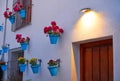 Flower pots in Granada Albaicin at sunset